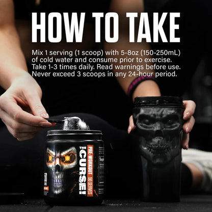 Protein House The Curse pre-workout tub with skull graphic being scooped into a black shaker cup